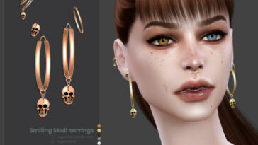 Smiling Skull earrings by sugar owl at TSR